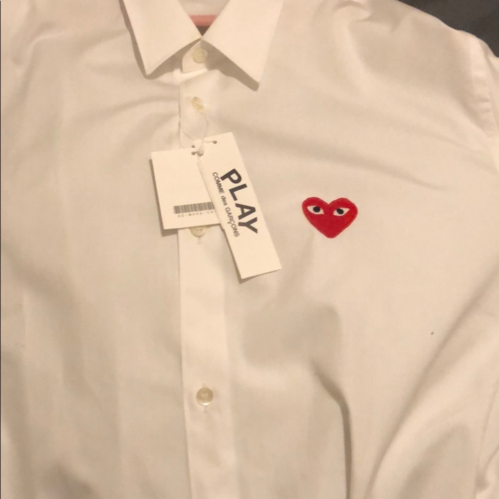 CDG Play button down NWT